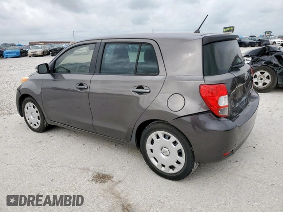 2010 Scion xD with VIN JTKKU4B40AJ057260, listed as a Copart auction lot 55053855 with 169,794 mi miles and Salvage Title. Bid and sale history available at DreamBid. Image 2.
