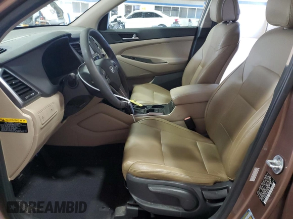 2017 Hyundai Tucson SE with VIN KM8J23A4XHU254056, listed as a Copart auction lot 51379665 with 33,213 mi miles and Salvage Title. Bid and sale history available at DreamBid. Image 7.