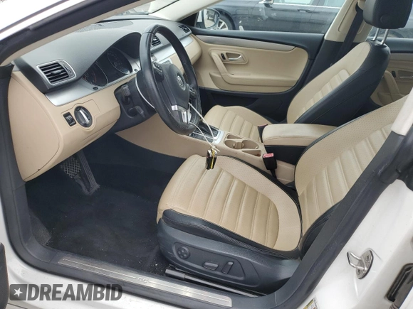2013 Volkswagen CC Sport z VIN WVWBN7AN3DE515466, wystawiony jako Copart lot #56829715 z przebiegiem 171 667 mil mil oraz Czysty tytuł • Clean title. Historia ofert i sprzedaży dostępna na DreamBid. Obrazek 7.