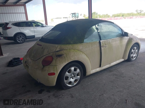 2003 Volkswagen Beetle GLS z VIN 3VWCK21Y33M309841, wystawiony jako IAAI lot #41883298 z przebiegiem 169 430 mil mil oraz . Historia ofert i sprzedaży dostępna na DreamBid. Obrazek 4.