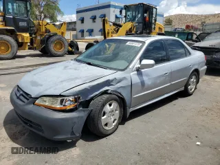 2002 Honda Accord EX z VIN 1HGCG16572A069123, wystawiony jako Copart lot #55861375 z przebiegiem 117 455 mil mil oraz Szkoda całkowita • Salvage title. Historia ofert i sprzedaży dostępna na DreamBid. Obrazek 1.