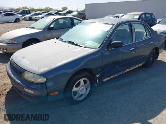 1994 Nissan Altima XE with VIN 1N4BU31D7RC140404, listed as a IAAI auction lot 41934492 with 160,073 mi miles and . Bid and sale history available at DreamBid. Image 2.