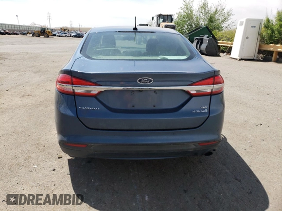 2018 Ford Fusion SE z VIN 3FA6P0LU1JR232876, wystawiony jako Copart lot #52911185 z przebiegiem 116 889 mil mil oraz Nie do naprawy • Non repairable. Historia ofert i sprzedaży dostępna na DreamBid. Obrazek 6.