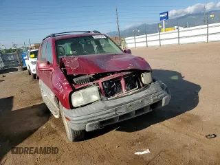 2001 Chevrolet Tracker LT z VIN 2CNBJ634716945832, wystawiony jako Copart lot #61967345 z przebiegiem 136 403 mil mil oraz Szkoda całkowita • Salvage title. Historia ofert i sprzedaży dostępna na DreamBid. Obrazek 13.