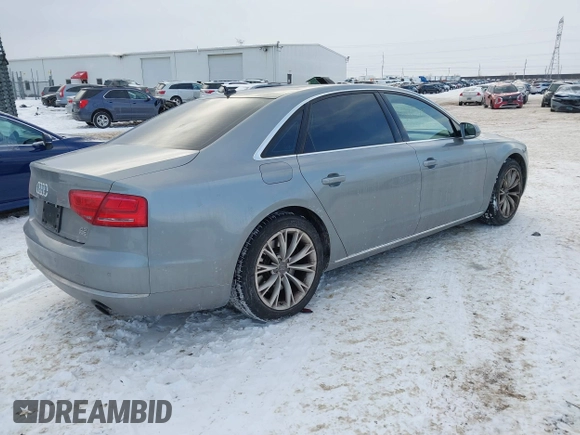 2012 Audi A8 with VIN WAURVAFD8CN017206, listed as a IAAI auction lot 41626707 with 138,922 mi miles and . Bid and sale history available at DreamBid. Image 4.