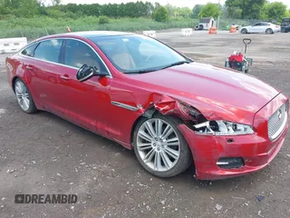 2015 Jaguar XJ Portfolio with VIN SAJWJ2GD1F8V84576, listed as a IAAI auction lot 42559246 with 156,370 mi miles and . Bid and sale history available at DreamBid. Image 1.