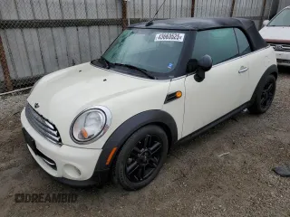 2014 MINI Convertible with VIN WMWZN3C55ET860996, listed as a Copart auction lot 43663525 with 140,387 mi miles and Clean Title. Bid and sale history available at DreamBid. Image 1.