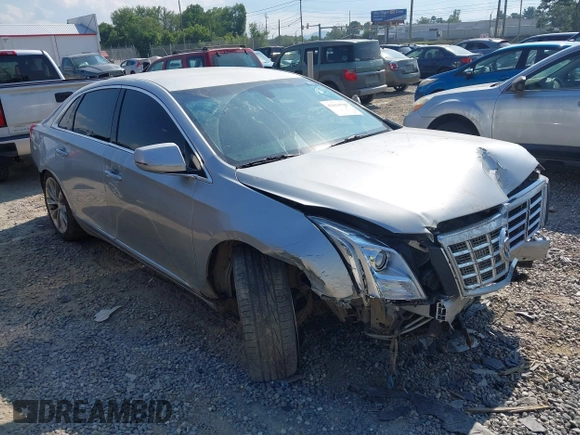 2013 Cadillac XTS Luxury z VIN 2G61R5S38D9228339, wystawiony jako IAAI lot #42664948 z przebiegiem 105 917 mil mil oraz . Historia ofert i sprzedaży dostępna na DreamBid. Obrazek 1.