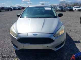 2016 Ford Focus S with VIN 1FADP3E24GL311146, listed as a IAAI auction lot 41983329 with 148,631 mi miles. Bid and sale history available at carsss.com. Image 6.