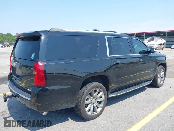 2019 Chevrolet Suburban LT with VIN 1GNSCJKC5KR304766, listed as a IAAI auction lot 42410264 with 105,171 mi miles and . Bid and sale history available at DreamBid. Image 4.