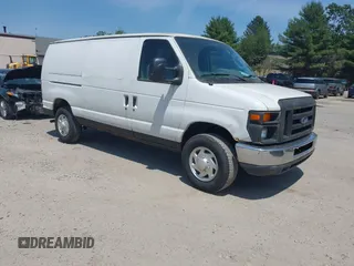 2012 Ford Econoline Cargo Recreational z VIN 1FTNE2EWXCDA60509, wystawiony jako IAAI lot #42514592 z przebiegiem 184 494 mil mil oraz . Historia ofert i sprzedaży dostępna na DreamBid. Obrazek 1.
