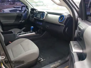2018 Toyota Tacoma SR5 with VIN 5TFAZ5CNXJX066952, listed as a IAAI auction lot 41894562 with 141,818 mi miles and . Bid and sale history available at DreamBid. Image 5.