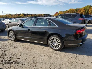 2015 Audi A8 z VIN WAUJGAFD7FN032176, wystawiony jako Copart lot #76943904 z przebiegiem 126 423 mil mil oraz Czysty tytuł • Clean title. Historia ofert i sprzedaży dostępna na DreamBid. Obrazek 2.