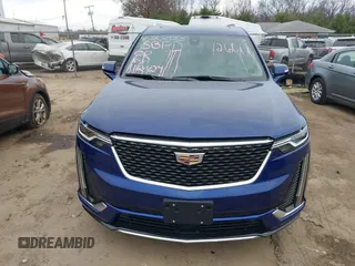 2023 Cadillac XT6 AWD Premium Luxury with VIN 1GYKPDRS2PZ126666, listed as a IAAI auction lot 40963833 with 23,535 mi miles and . Bid and sale history available at DreamBid. Image 13.