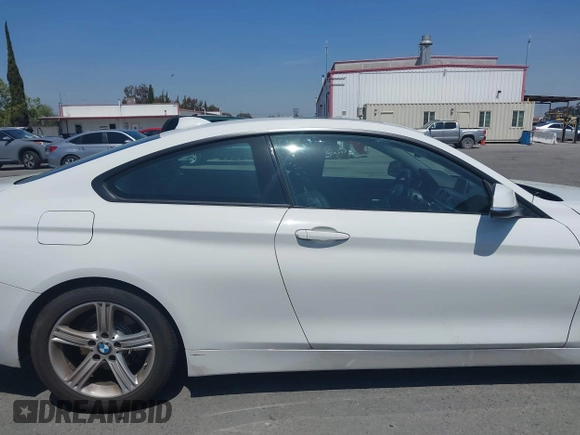 2015 BMW 4 Series 428i with VIN WBA3N7C54FK225367, listed as a IAAI auction lot 41958685 with 142,104 mi miles. Bid and sale history available at carsss.com. Image 13.