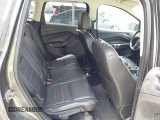 2015 Ford Escape Titanium z VIN 1FMCU0JX3FUA71770, wystawiony jako IAAI lot #42085635 z przebiegiem 141 890 mil mil oraz . Historia ofert i sprzedaży dostępna na DreamBid. Obrazek 8.