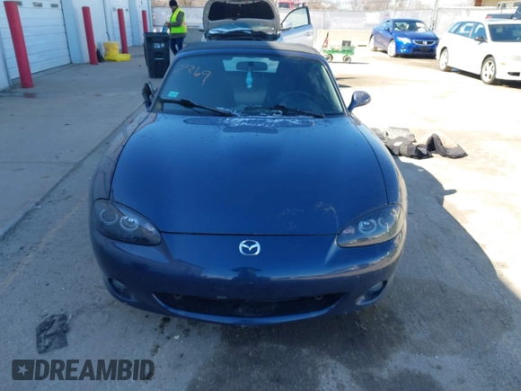 2002 Mazda MX-5 Miata Cloth z VIN JM1NB353920234533, wystawiony jako IAAI lot #41735487 z przebiegiem 112 661 mil mil oraz . Historia ofert i sprzedaży dostępna na DreamBid. Obrazek 12.