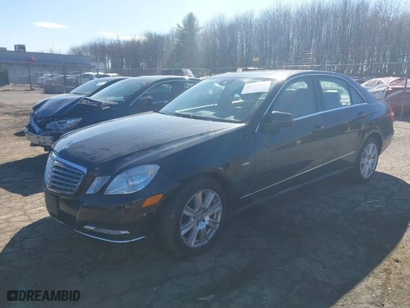 2012 Mercedes-Benz E-Class E 350 Luxury with VIN WDDHF8JB5CA613431, listed as a IAAI auction lot 41693043 with 126,721 mi miles. Bid and sale history available at carsss.com. Image 2.