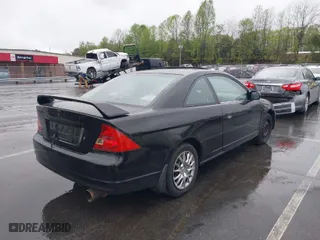 2001 Honda Civic EX with VIN 1HGEM22971L036545, listed as a IAAI auction lot 41978213 with 328,927 mi miles. Bid and sale history available at carsss.com. Image 4.