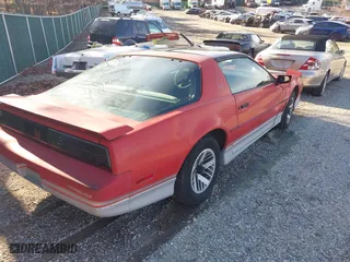 1985 Pontiac Firebird Trans Am with VIN 1G2FW87H3FN208733, listed as a IAAI auction lot 41705988 with 87,906 mi miles. Bid and sale history available at carsss.com. Image 4.