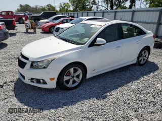 2014 Chevrolet Cruze 2LT z VIN 1G1PE5SB8E7238813, wystawiony jako Copart lot #54631475 z przebiegiem 130 776 mil mil oraz Czysty tytuł • Clean title. Historia ofert i sprzedaży dostępna na DreamBid. Obrazek 1.