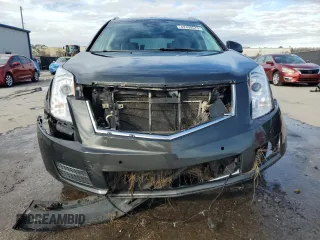 2014 Cadillac SRX Luxury Collection with VIN 3GYFNBE31ES561151, listed as a Copart auction lot 42499575 with 140,677 mi miles and Salvage Title. Bid and sale history available at carsss.com. Image 5.