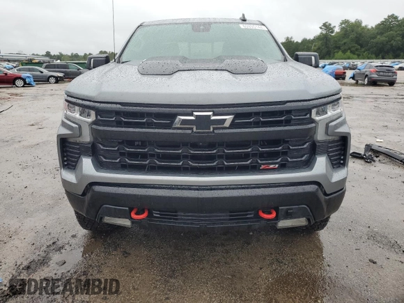 2023 Chevrolet Silverado 1500 LT Trail Boss with VIN 3GCUDFE80PG322764, listed as a Copart auction lot 65935144 with 13,146 mi miles and Salvage Title. Bid and sale history available at DreamBid. Image 5.