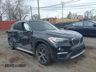 2018 BMW X1 xDrive28i z VIN WBXHT3Z36J4A66772, wystawiony jako IAAI lot #42030829 z przebiegiem Nie podano mil oraz . Historia ofert i sprzedaży dostępna na DreamBid. Obrazek 1.