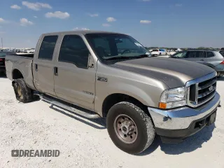 2002 Ford F-350 XL with VIN 3FTSW31F62MA15436, listed as a Copart auction lot 75384314 with 284,637 mi miles and Salvage Title. Bid and sale history available at DreamBid. Image 4.