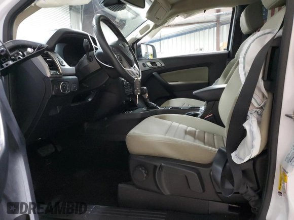 2023 Ford Ranger XL with VIN 1FTER1EH1PLE00450, listed as a Copart auction lot 80669574 with 25,223 mi miles and Salvage title. Bid and sale history available at DreamBid. Image 7.