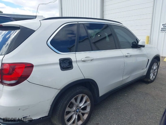 2016 BMW X5 xDrive35i with VIN 5UXKR0C59G0S93024, listed as a IAAI auction lot 42059465 with 121,334 mi miles. Bid and sale history available at carsss.com. Image 14.