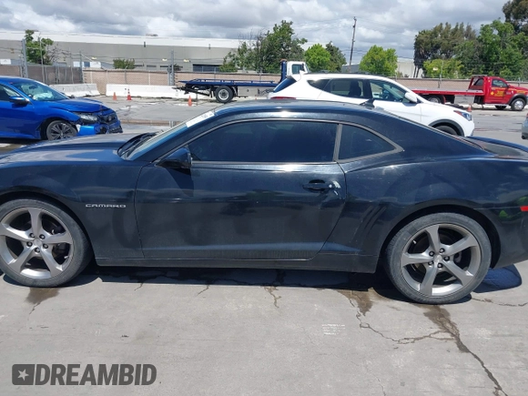 2013 Chevrolet Camaro LT z VIN 2G1FB1E32D9182026, wystawiony jako IAAI lot #42228559 z przebiegiem 210 159 mil mil oraz . Historia ofert i sprzedaży dostępna na DreamBid. Obrazek 15.