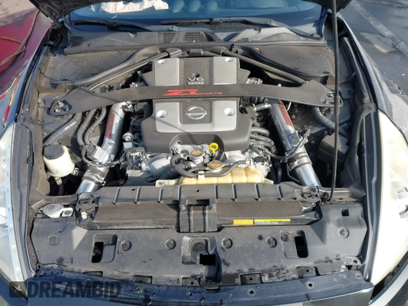 2014 Nissan 370Z Touring with VIN JN1AZ4EH1EM631097, listed as a IAAI auction lot 41230197 with 85,304 mi miles. Bid and sale history available at carsss.com. Image 10.