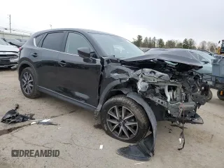 2017 Mazda CX-5 Grand Touring with VIN JM3KFBDL0H0194037, listed as a Copart auction lot 50365495 with 96,829 mi miles and Salvage Title. Bid and sale history available at carsss.com. Image 4.