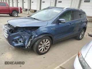 2018 Ford Escape Titanium with VIN 1FMCU9J93JUC01903, listed as a Copart auction lot 57337045 with 59,276 mi miles and Salvage title. Bid and sale history available at DreamBid. Image 1.