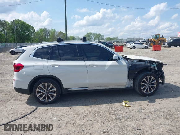 2019 BMW X3 sDrive30i z VIN 5UXTR7C51KLF33271, wystawiony jako IAAI lot #42102581 z przebiegiem 65 344 mil mil oraz . Historia ofert i sprzedaży dostępna na DreamBid. Obrazek 14.
