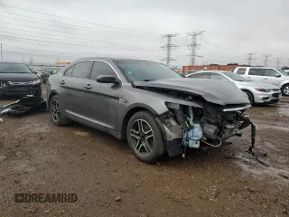 2015 Ford Taurus SEL with VIN 1FAHP2E8XFG104350, listed as a Copart auction lot 49139655 with 161,857 mi miles and Salvage title. Bid and sale history available at DreamBid. Image 4.