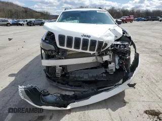 2021 Jeep Cherokee 80th Anniversary with VIN 1C4PJMMX4MD135393, listed as a Copart auction lot 52033255 with 76,546 mi miles and Salvage Title. Bid and sale history available at carsss.com. Image 5.