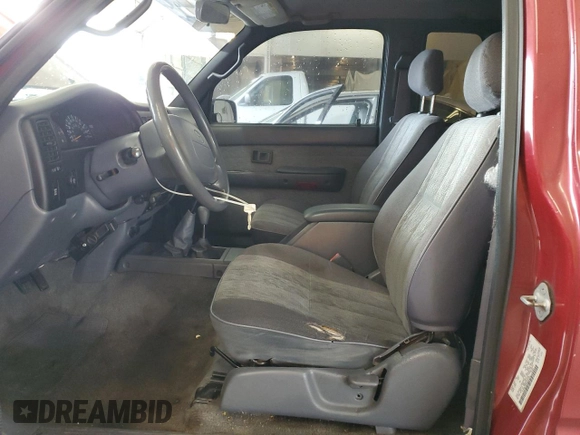 1998 Toyota Tacoma with VIN 4TAWN72NXWZ132180, listed as a Copart auction lot 65593695 with 266,993 mi miles and Salvage title. Bid and sale history available at DreamBid. Image 7.
