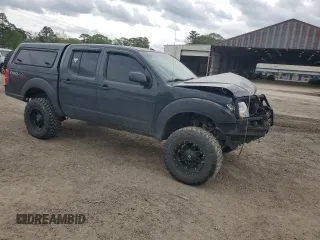2012 Nissan Frontier Pro-4X with VIN 1N6AD0EVXCC415470, listed as a Copart auction lot 50650915 with 157,160 mi miles and Salvage title. Bid and sale history available at DreamBid. Image 4.