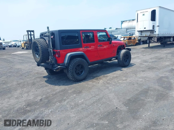 2014 Jeep Wrangler Unlimited Rubicon with VIN 1C4BJWFG0EL326979, listed as a IAAI auction lot 41913129 with 118,548 mi miles and . Bid and sale history available at DreamBid. Image 4.