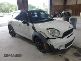 2013 MINI Countryman S ALL4 with VIN WMWZC5C52DWP32200, listed as a IAAI auction lot 42732111 with 166,027 mi miles and . Bid and sale history available at DreamBid. Image 1.