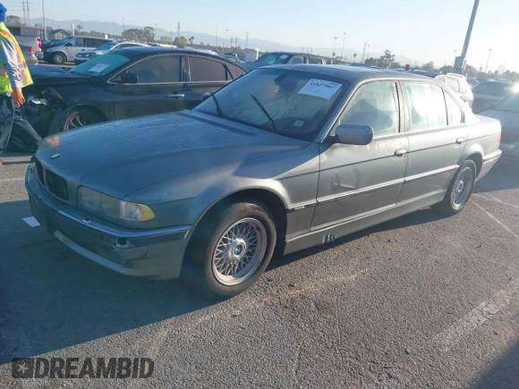 2001 BMW 7 Series 740iL with VIN WBAGH83491DP25818, listed as a IAAI auction lot 41827907 with 125,670 mi miles. Bid and sale history available at carsss.com. Image 2.