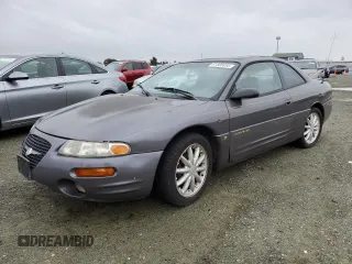 1997 Chrysler Sebring LXi with VIN 4C3AU52N2VE183090, listed as a Copart auction lot 81855454 with 157,590 mi miles and Salvage Title. Bid and sale history available at DreamBid. Image 1.