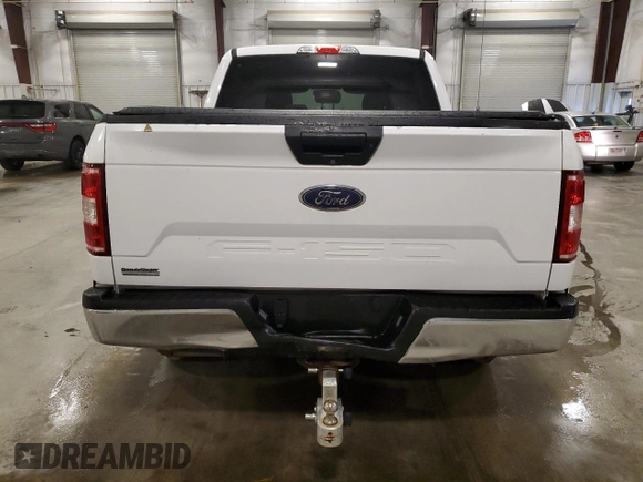 2018 Ford F-150 XL with VIN 1FTEW1E51JKD25812, listed as a Copart auction lot 58729825 with 136,031 mi miles and Salvage title. Bid and sale history available at DreamBid. Image 6.