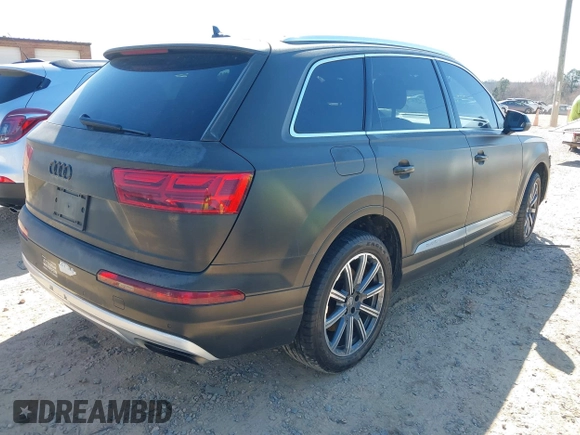2017 Audi Q7 Premium Plus z VIN WA1LAAF76HD047018, wystawiony jako IAAI lot #41657235 z przebiegiem 159 375 mil mil oraz . Historia ofert i sprzedaży dostępna na DreamBid. Obrazek 4.