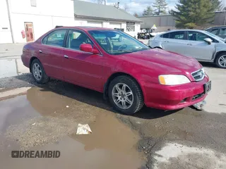 2000 Acura TL with VIN 19UUA5667YA021653, listed as a IAAI auction lot 41663947 with 157,269 mi miles. Bid and sale history available at carsss.com. Image 1.