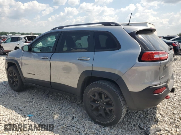 2016 Jeep Cherokee Trailhawk with VIN 1C4PJMBS4GW353088, listed as a Copart auction lot 62275145 with 129,758 mi miles and Clean title. Bid and sale history available at DreamBid. Image 2.