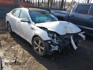 2019 Kia Optima LX with VIN 5XXGT4L33KG371724, listed as a IAAI auction lot 41854000 with 48,667 mi miles. Bid and sale history available at carsss.com. Image 1.