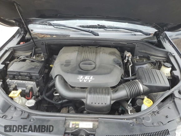 2014 Jeep Grand Cherokee Laredo with VIN 1C4RJEAGXEC130094, listed as a Copart auction lot 55997925 with 151,407 mi miles and Salvage Title. Bid and sale history available at DreamBid. Image 11.